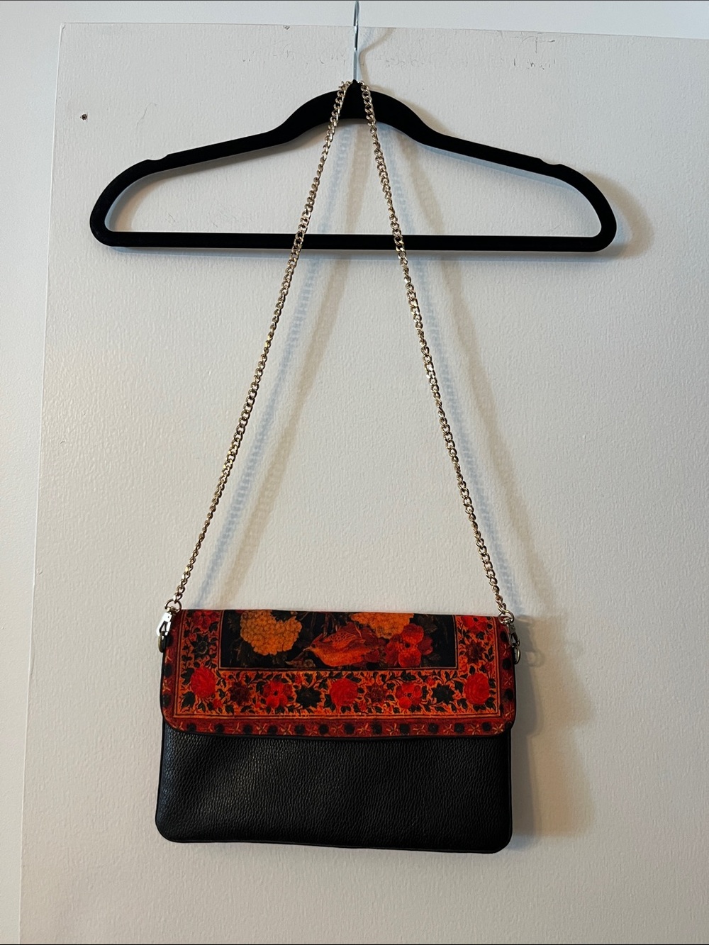 Black Crossbody Bag with Red Floral Accent